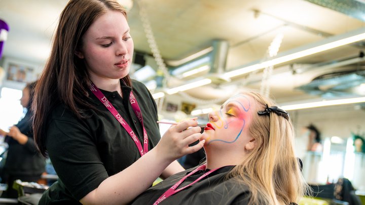 make up student works on client