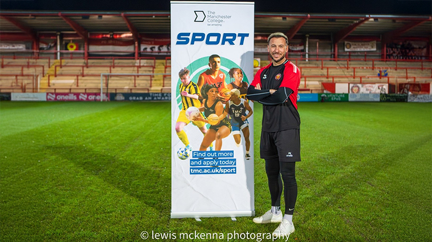 Adam Le Fondre stood on the pitch at FC United of Manchester’s Broadhurst Park Stadium.