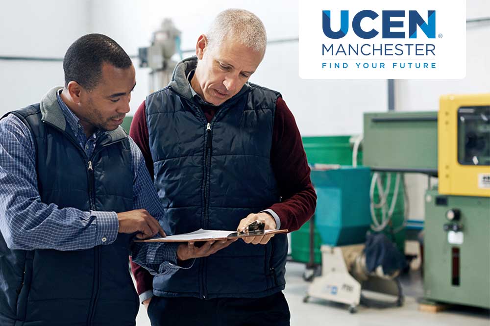 Two men discussing a document