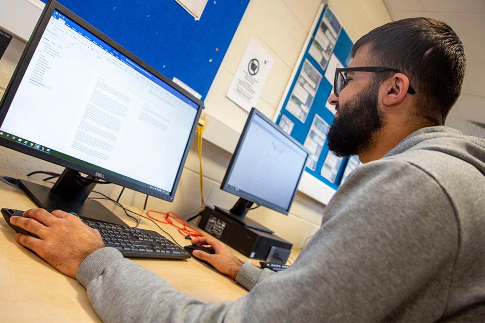 A student working on a computer