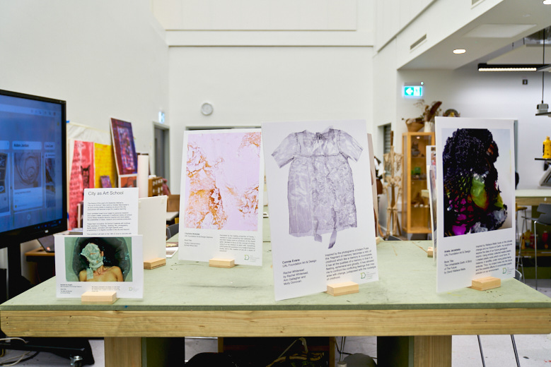 Classroom displaying art pieces made by students at The Manchester College