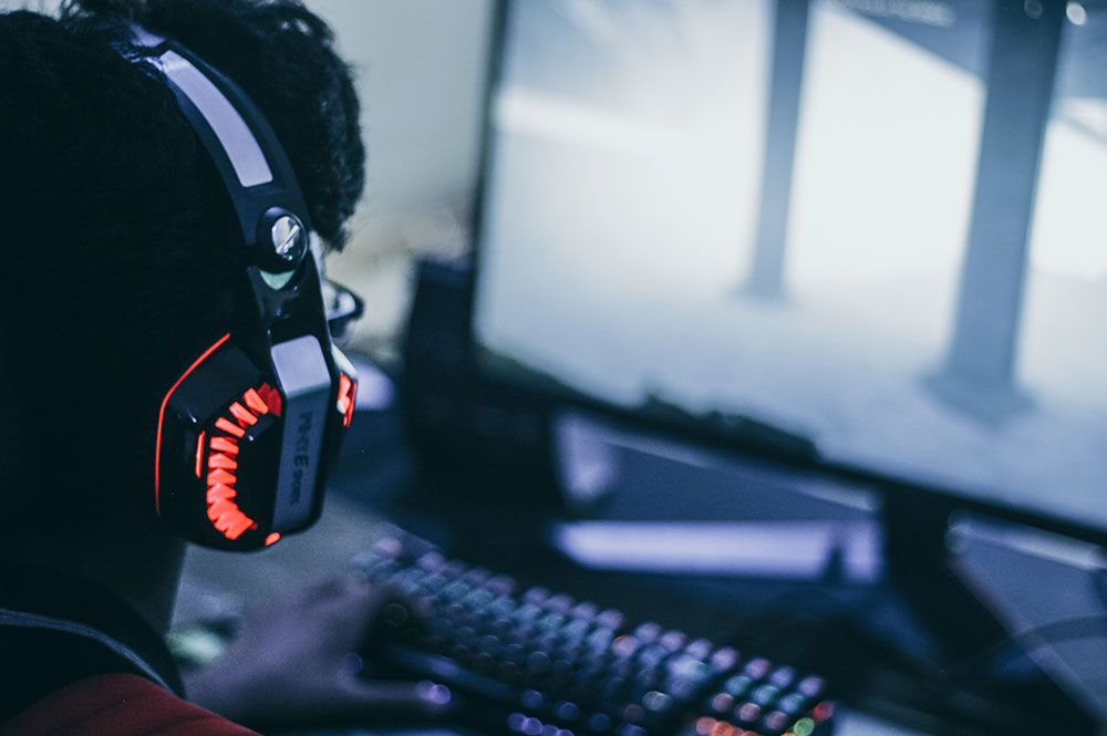 Over-the-shoulder view of an animation student on a computer