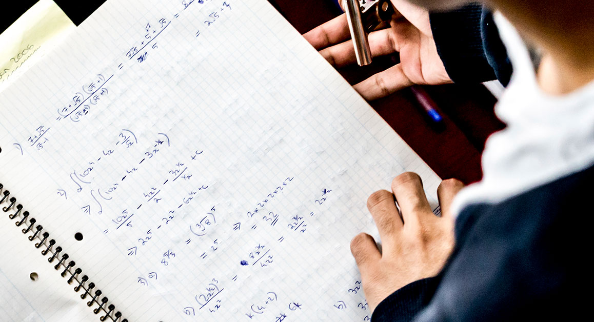A student doing maths work