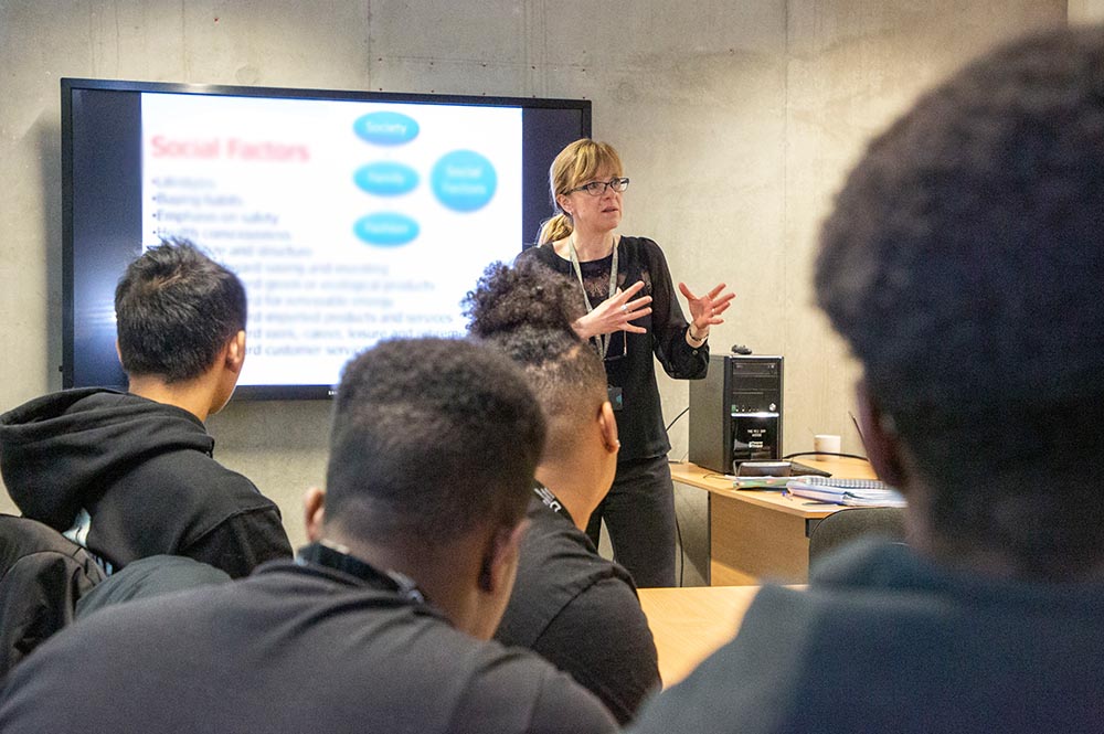 Group of students listening to a presentation