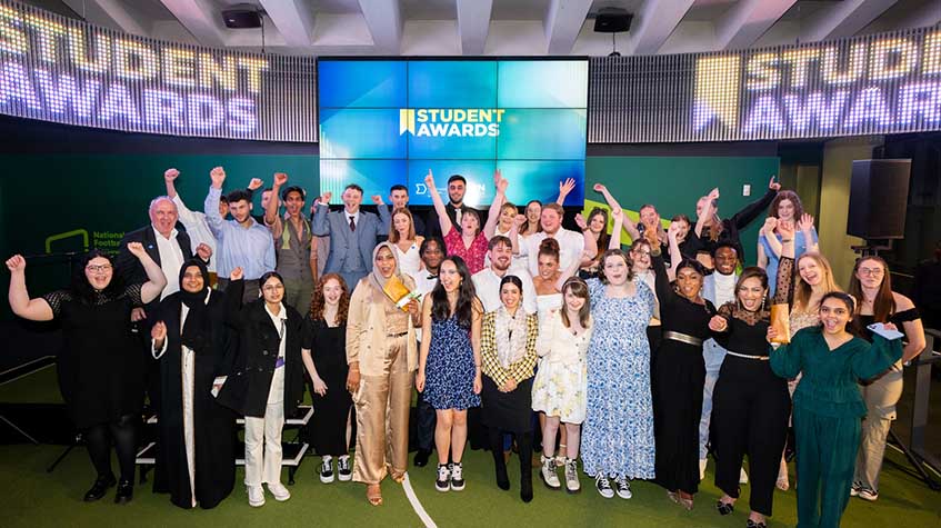 Photograph of all the finalists that attended the 2024 Student Awards on stage together.