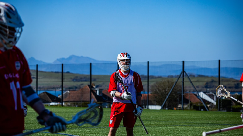 Wil Baker playing lacrosse