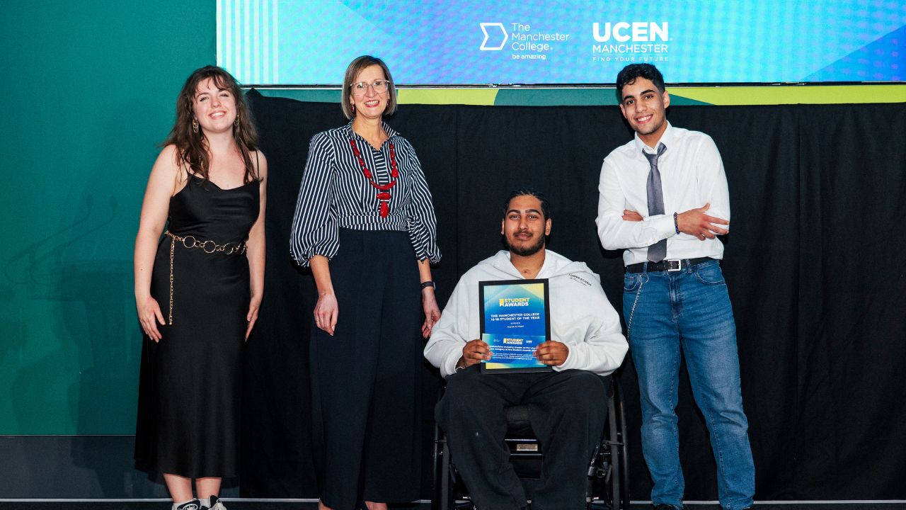 Student award winner with certificate at The Manchester College Student Awards 2026