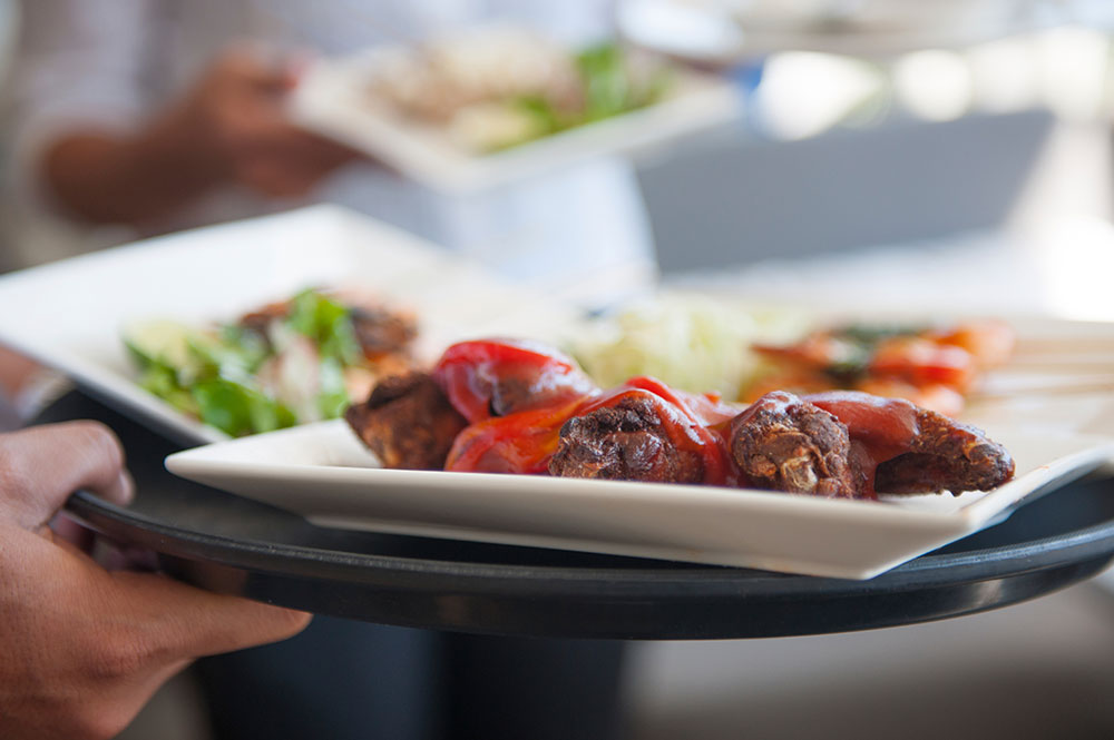 Close-up of a plate of food being served
