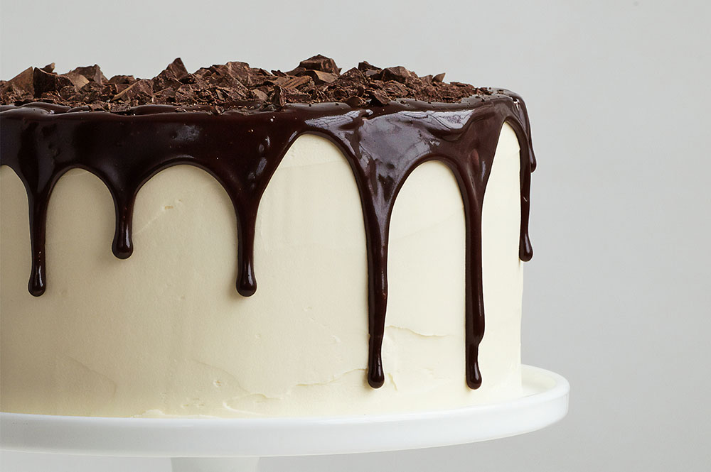Cake with dripping chocolate ganache decoration