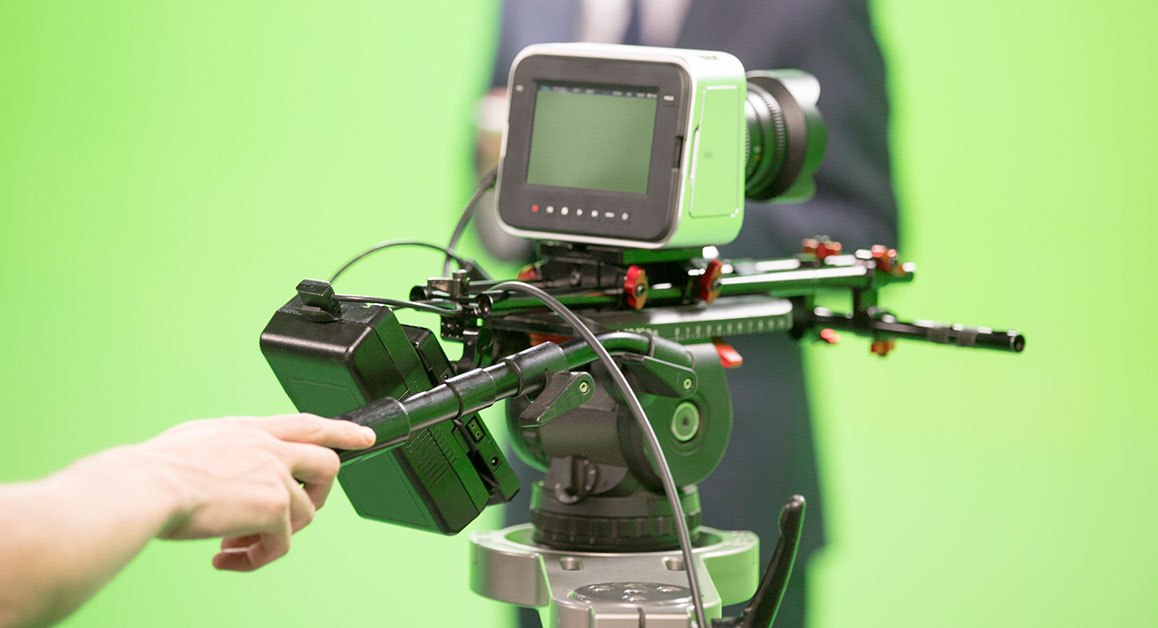 Over-the-shoulder view of an animation student on a computer