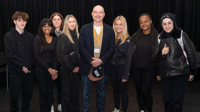 Joe Duttine poses with The Manchester College acting students
