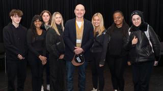 Joe Duttine poses with The Manchester College acting students