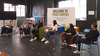 Photograph of staff from Barclays taking part in a Q&A with students from The Manchester College at Shena Simon Campus.