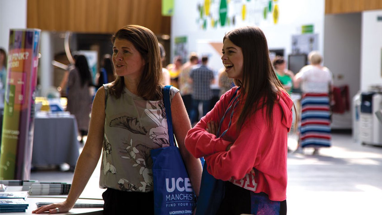 A parent and student attending a UCEN Manchester Open Day