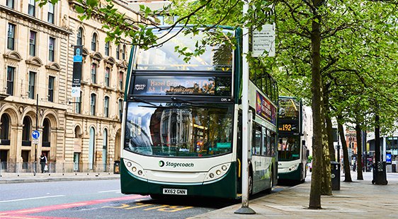 A bus stopping in Manchester City Centre