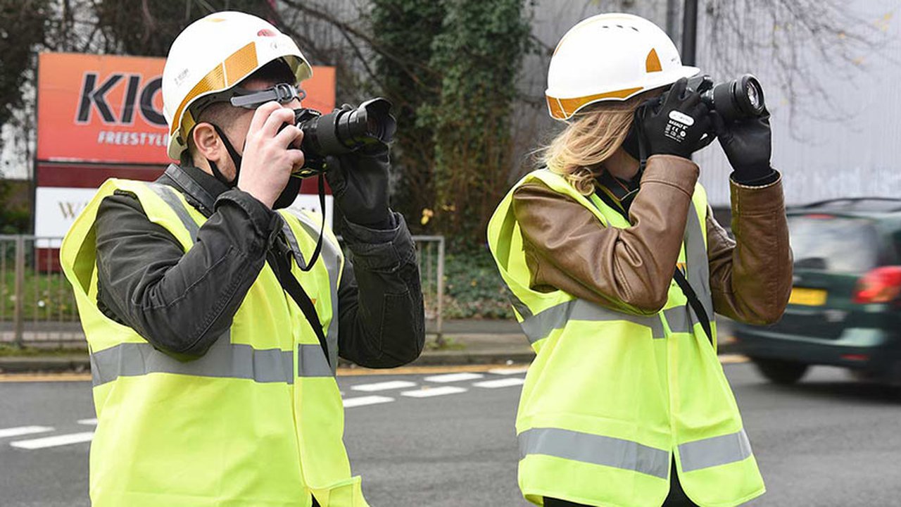 Photography students Rhodri and Jake taking pictures.