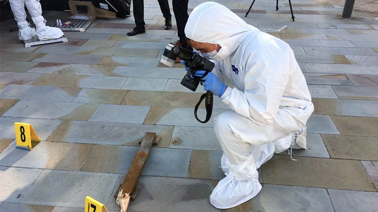 A forensic investigator at a crime scene