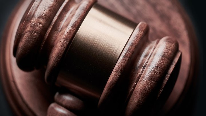 Closeup photo of a gavel in a legal court