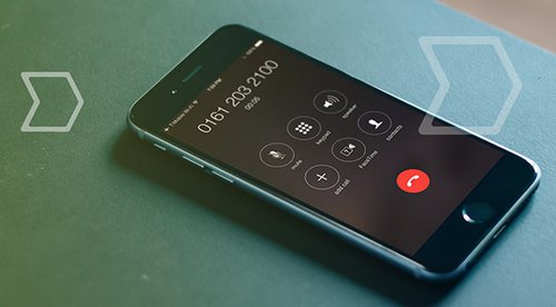 A mobile phone on a desk