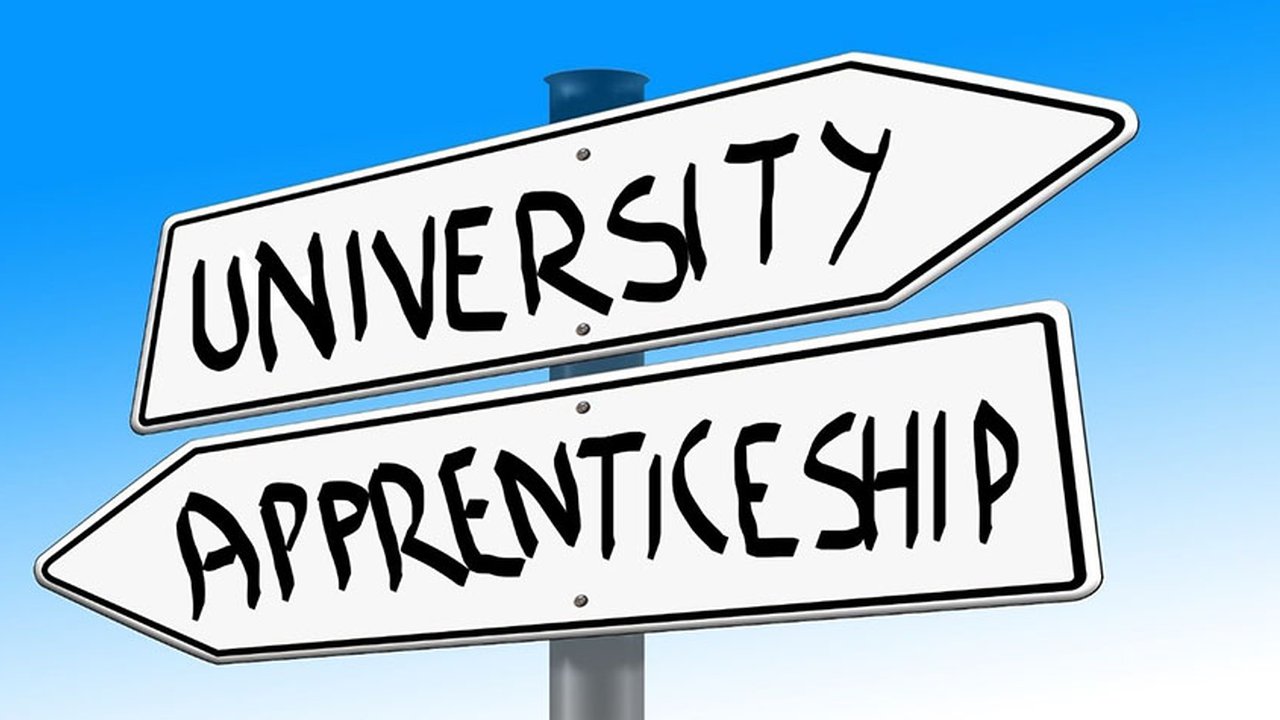 A university sign and an apprenticeship sign