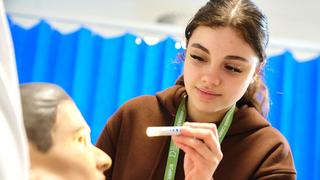 Learner doing practical work in a Health and Social Care class