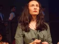 Female student pulling a serious face while performing