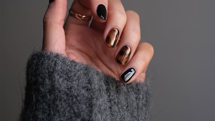 Close-up of colourful nails