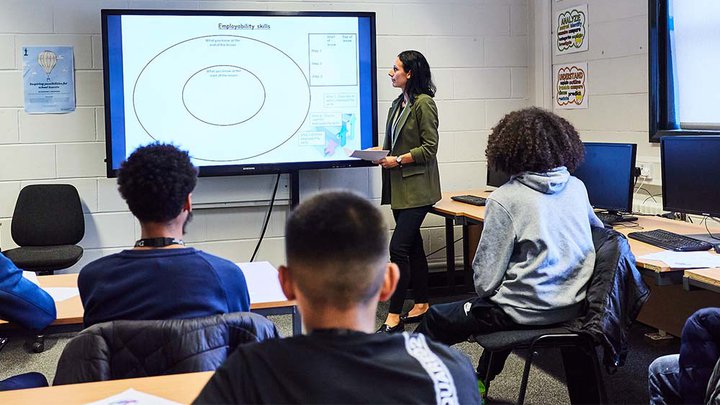 Students learning in a classroom