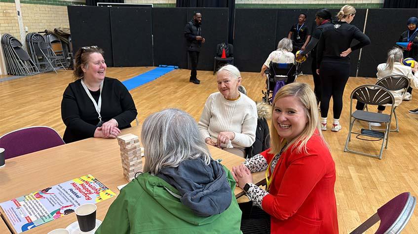 TMC colleagues join members of the local community at a social event at Harpurhey campus.