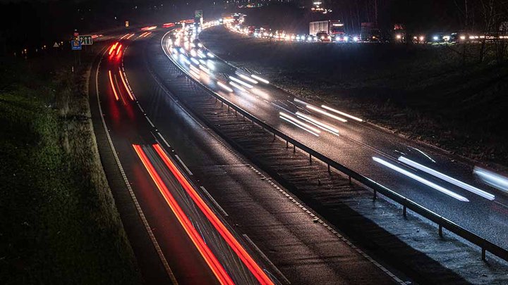 Nighttime time-lapse of a UK dual carriage way with trailing tail lights
