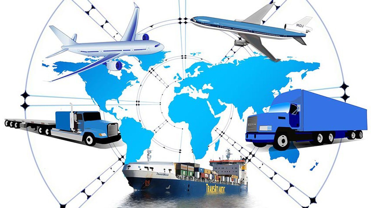 A globe with two planes, two trucks and a cargo ship around it