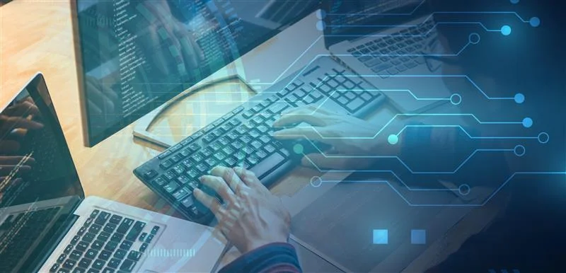 Over the shoulder view of a learner using a computer