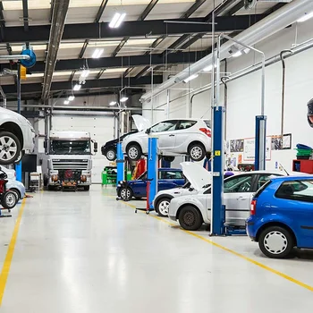 Industry-standard automotive facilities including MOT testing bay and mechanical workshop
