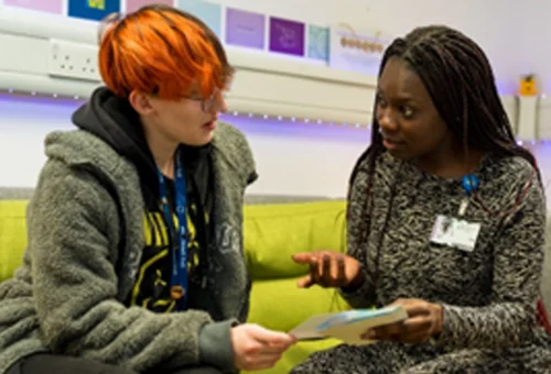 Two students talking together