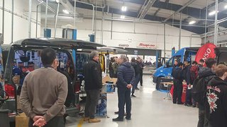 Photograph of the Independent Garages Network event taking place in the industry-standard automotive and engineering facilities at The Manchester College's Openshaw Campus.