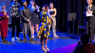 Students competing in the grand final of TMC's Got Talent 2026 on stage in the Studio Theatre at City Campus Manchester.