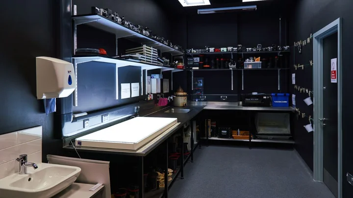 Photography preparation and film processing room at The Manchester College City Campus Manchester featuring cameras, equipment storage and specialist workspaces.