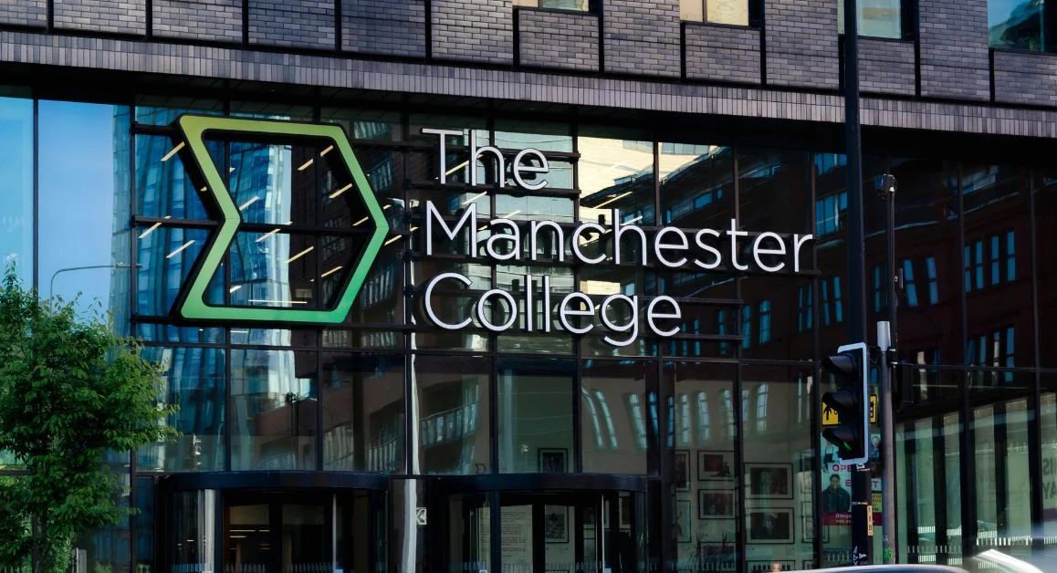 Exterior of The Manchester College Building Doors with Logo signage