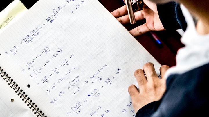 A student doing maths work