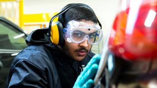 Learner attending an automotive course