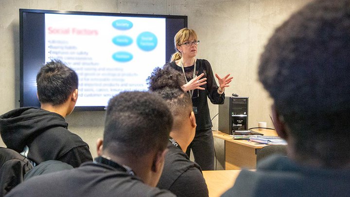 Group of students listening to a presentation