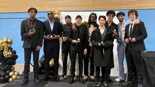 Students receiving trophies at the Sports, Public Service and Criminology Awards