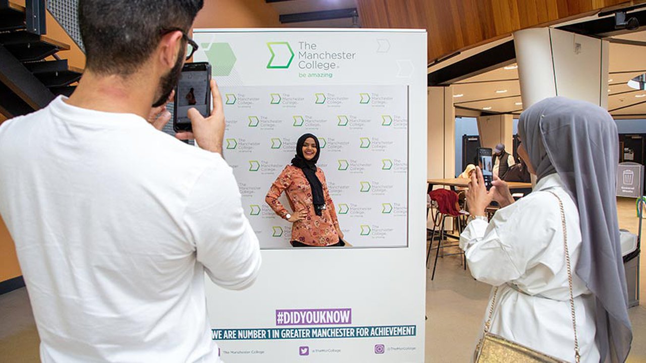 Students taking photos at GCSE results day