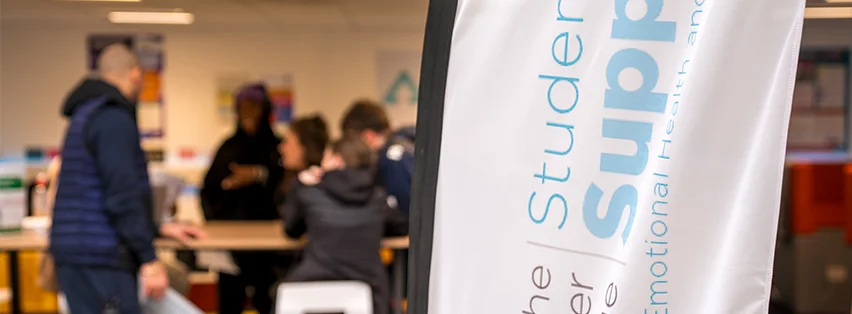 Close-up of a Student Support flag