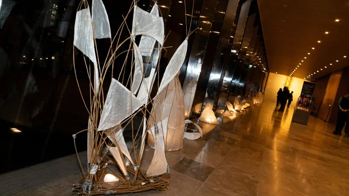 Large-scale student sculpture installation displayed at a public Visual Arts exhibition showcasing creative design work from The Manchester College.