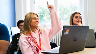 Student engaging in one of our business courses