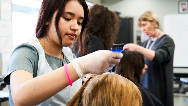 Student colouring hair