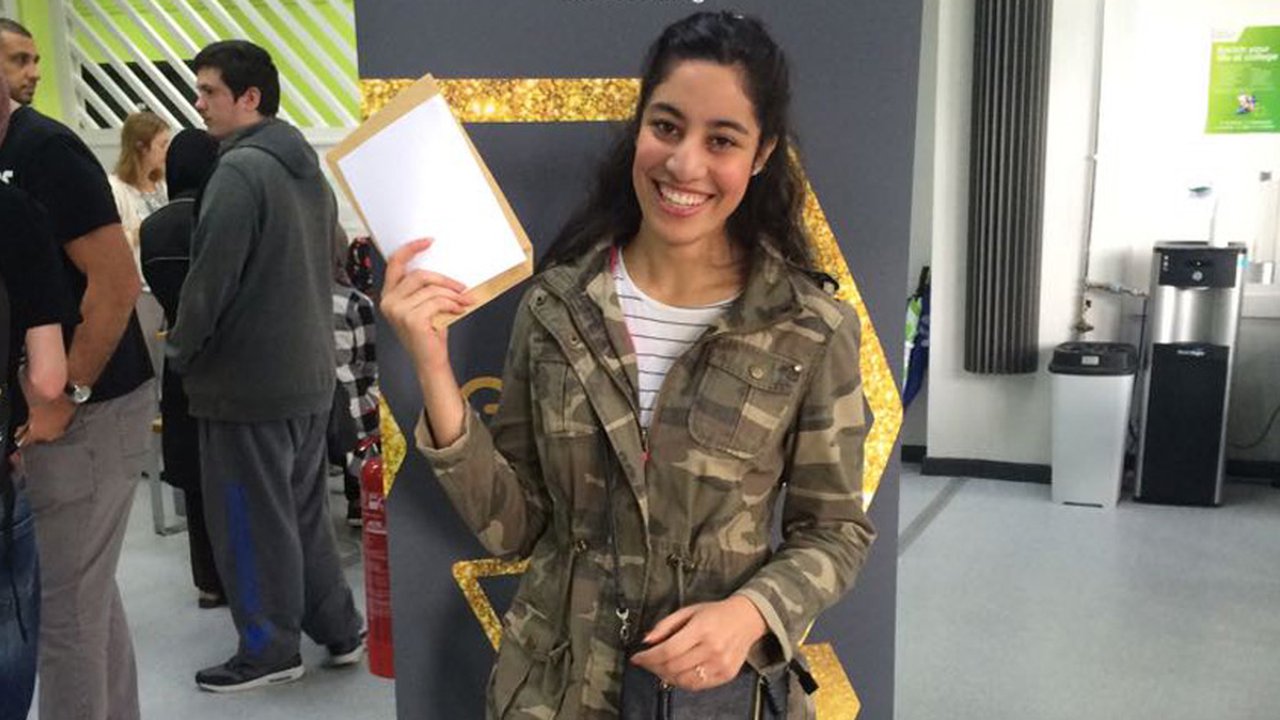 Student Aya Aldulaimi celebrates her GCSE grades