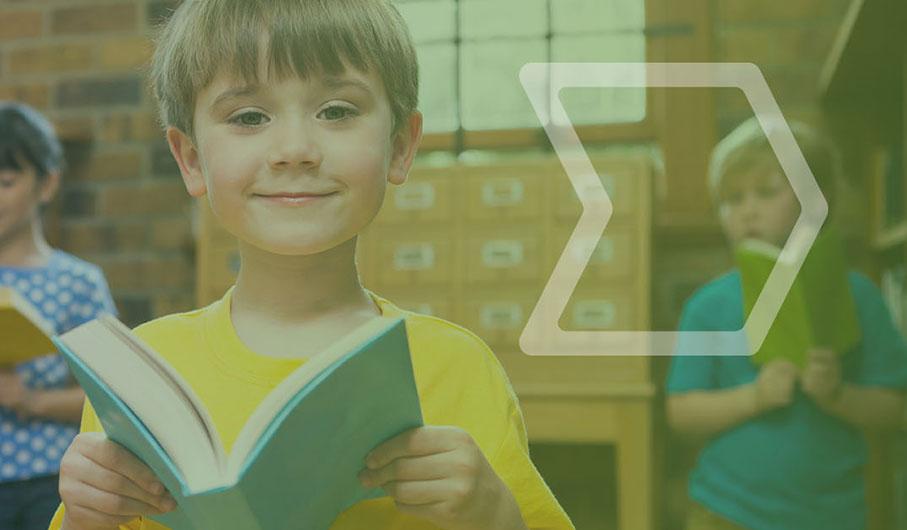 a child with a book in his hand