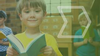 a child with a book in his hand